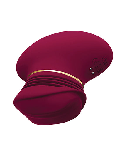 Mulberry Wine Riana palm-sized clitoral pleasure toy with textured ridges