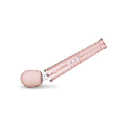 Le Wand Petite rechargeable wand vibrator in rose gold on a neutral background