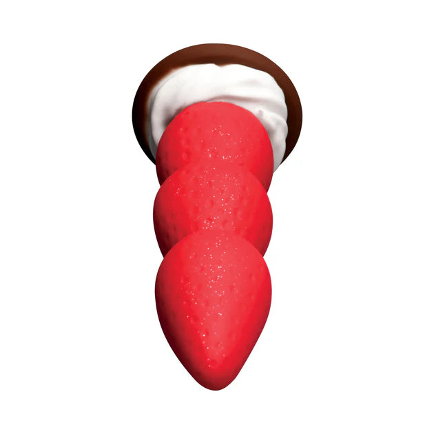 Premium silicone strawberry novelty dildo with smooth texture.
