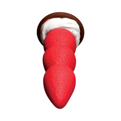 Premium silicone strawberry novelty dildo with smooth texture.
