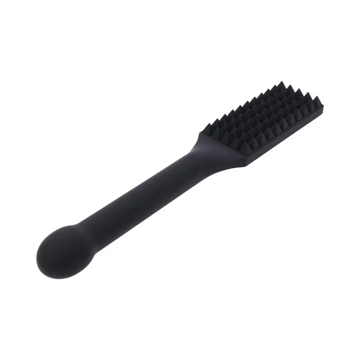 silicone paddle spikes close up detail bdsm impact
