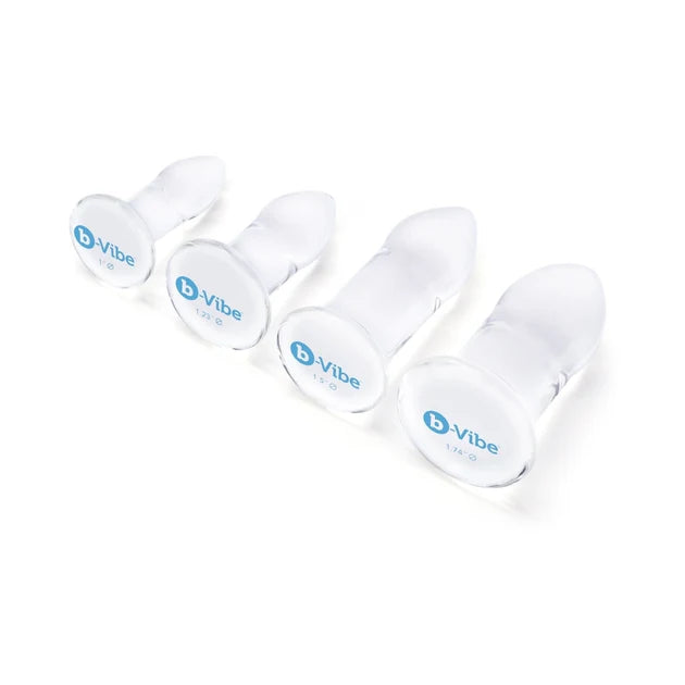 b-Vibe 4-Piece Anal Dilators Glass Plug Set featuring graduated body-safe glass plugs in four sizes.