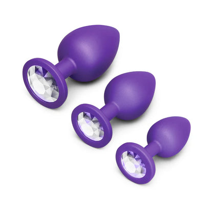 b-Vibe Jewel Butties Bundle of body-safe silicone butt plugs with decorative jewel bases and progressive sizing.